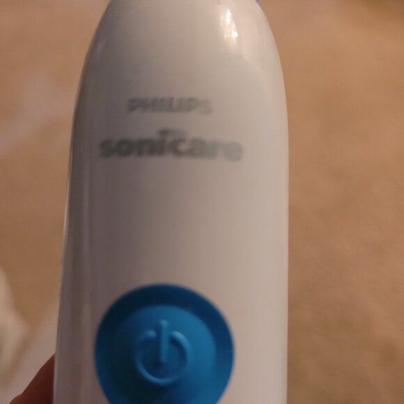 New, never used sonicare electric toothbrush with charging base - Picture 2 of 3